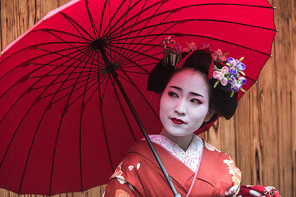 traditional geisha maiko girl at street of kyoto japan
